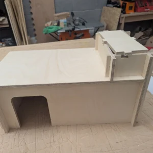 Rabbit hide, designed, CNC cut and hand finished in Bristol UK. With isolated cool and hot chamber. Small pet hide. Rabbit hide with cooling heating chamber UK