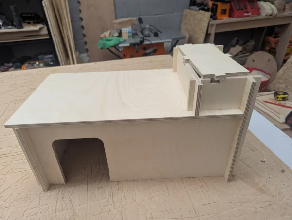 Rabbit hide, designed, CNC cut and hand finished in Bristol UK. With isolated cool and hot chamber. Small pet hide. Rabbit hide with cooling heating chamber UK