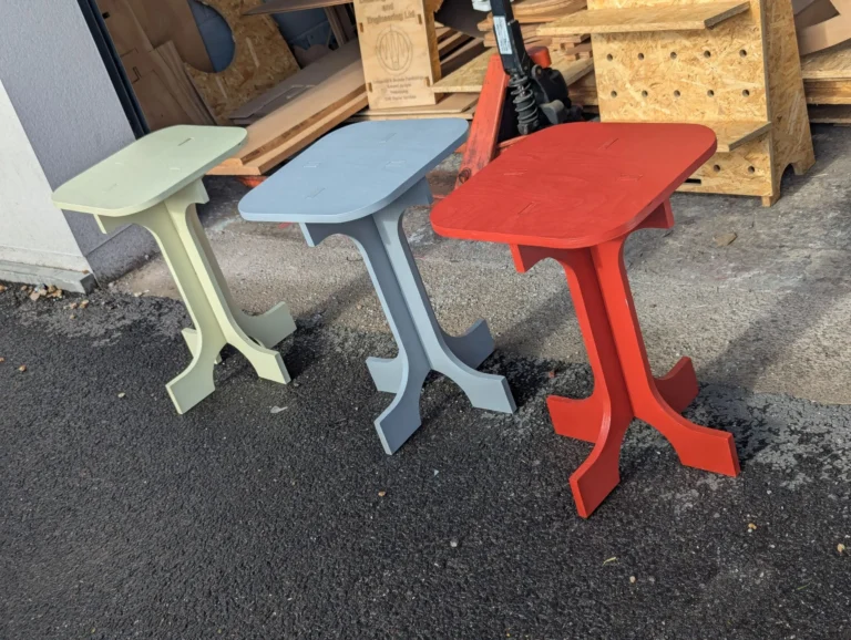 Multi-coloured collapsible multi functional table cnc cut and hand finished in Bristol