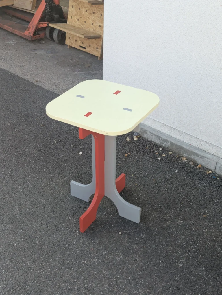 Multi-coloured collapsible multi functional table cnc cut and hand finished in Bristol